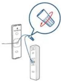 Diagram showing a device connected to a remote control panel, with a magnified view of the screen displaying a circular icon.