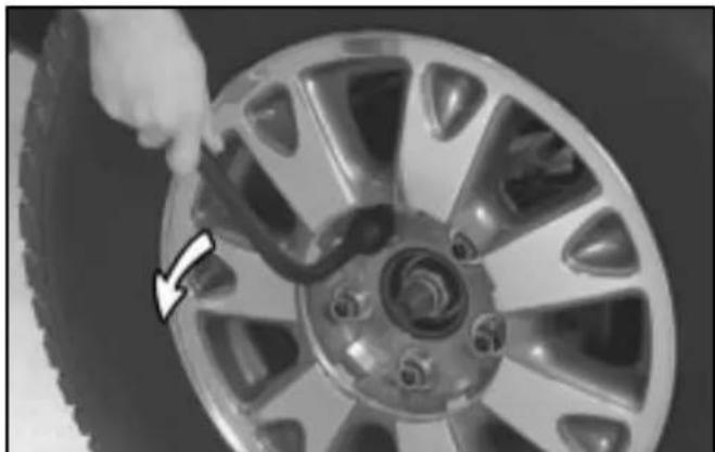 Buick Park Avenue (2002) - Removing the Flat Tire and Installing the Spare Tire - 1