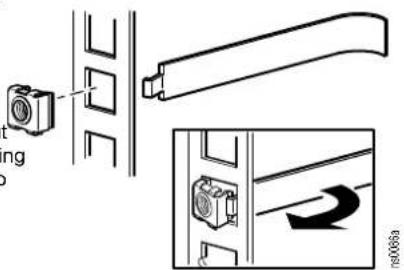 Technical diagram showing a camera module connected to a wall-mounted device, with an inset view of the device's rotation arrow.