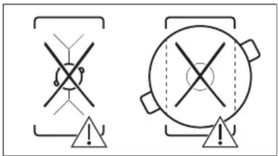 Two safety warning symbols: crossed-out cross symbol and triangular warning triangle with exclamation mark