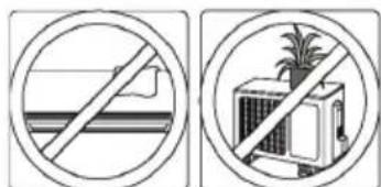 Two circular signs with prohibition symbols: one showing a barrier and another showing a device with a palm tree.