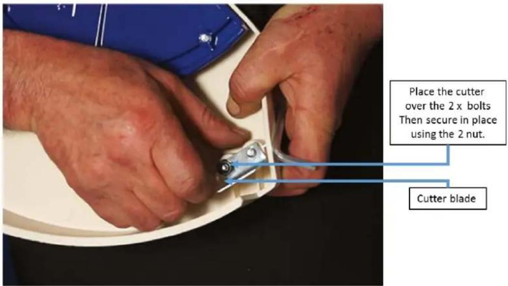 Place the cutter over the 2 x bolts Then secure in place using the 2 nut. Cutter blade