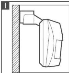 Technical line drawing of a mechanical component mounted on a vertical wall (no text or symbols)