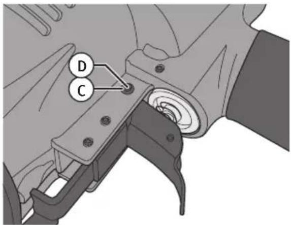Technical diagram of a mechanical assembly with labeled parts D and C, showing a component being inserted into a housing.