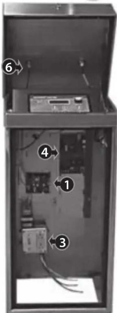 Diagram of an electronic device interior with numbered components, likely a control panel or enclosure.