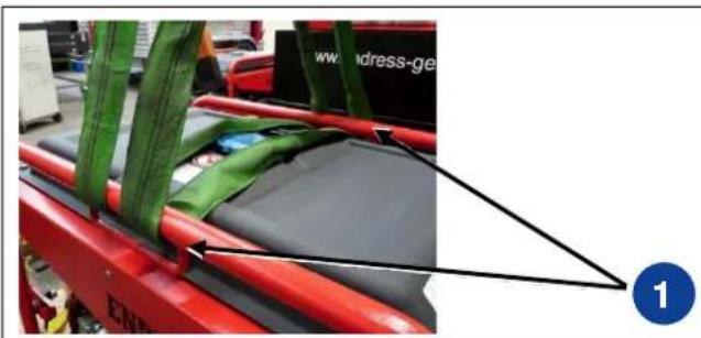 Red industrial machine with green belt and black seat, no visible text or symbols on the device itself