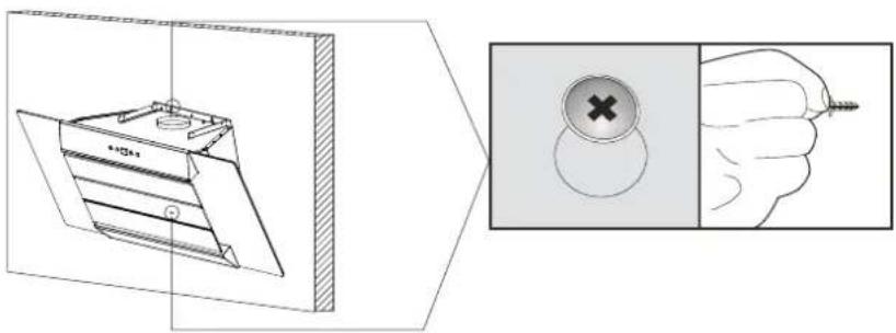 Technical diagram showing a mechanical device and its magnified view of a circular component with a cross mark, alongside a hand holding a pencil.