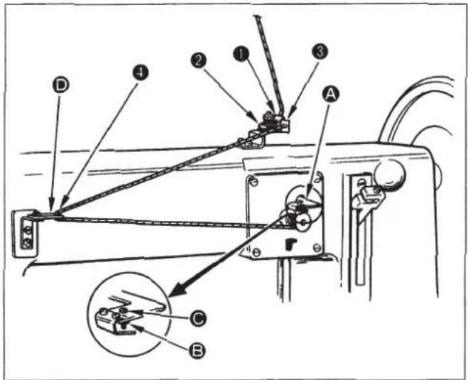 Technical diagram of a mechanical device with labeled components and an inset showing a clamping mechanism.