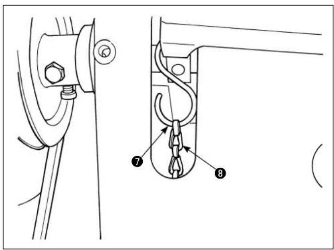 Technical diagram showing two mechanical components with labeled parts, including a hook and rope assembly.