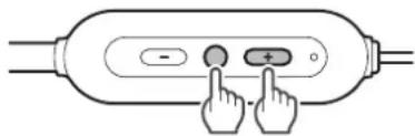 Diagram showing two hands pointing to a button labeled with minus and plus signs inside a device casing
