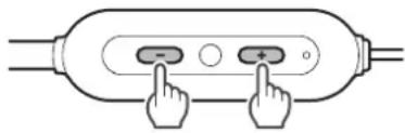 Diagram showing two hands pointing to a button labeled with minus and plus signs inside a device casing