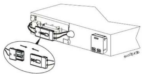 Technical diagram showing a device with labeled components and an inset view of a connector or module assembly.