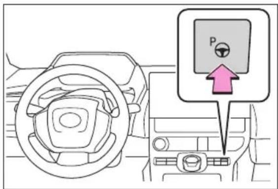 Diagram showing car interior with steering wheel, dashboard, and parking pad labeled P with an upward arrow