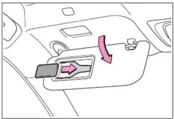 Diagram showing car interior with directional arrows and a highlighted component, likely indicating movement or flow.