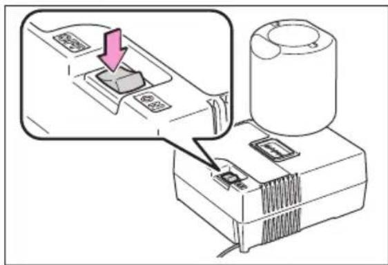 Diagram showing a device with a button labeled '按钮1' and an arrow pointing to it, indicating a process or operation.