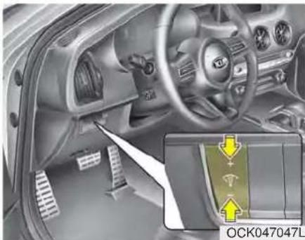 Interior view of a car dashboard and steering wheel (no visible text or symbols)