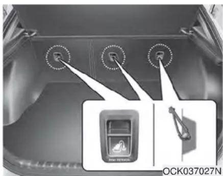 Top-down view of a car trunk with three sensors and a highlighted device (no text or symbols visible)