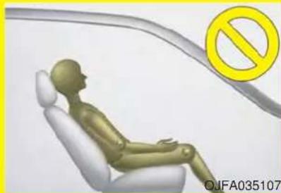3D rendered human figure seated in a white chair with a yellow prohibition symbol on the right (no text or symbols on the figure itself)