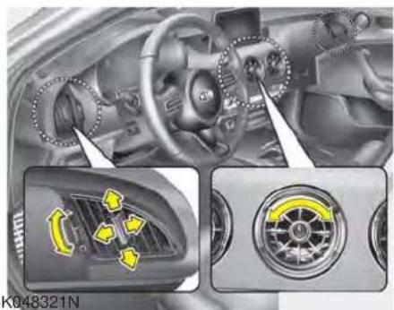 Interior view of a car dashboard and air vent system (no visible text or symbols)