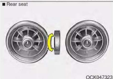 Two car wheel rim components with a yellow belt and circular head, no text or symbols visible