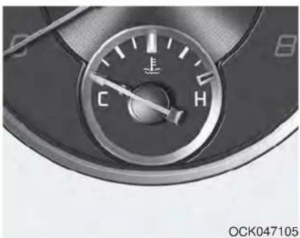 Close-up of a car dashboard dial with Chinese and English labels (no readable text or symbols beyond the dial)