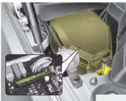 Close-up of a mechanical assembly with a highlighted inset showing internal components (no visible text or symbols)