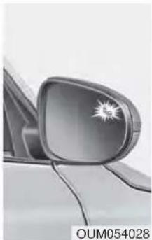 Close-up of a car's side mirror with a starburst effect, no visible text or symbols on the object itself.