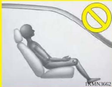 3D rendered human figure seated in a car seat with a yellow prohibition symbol (no text or symbols on the figure itself)