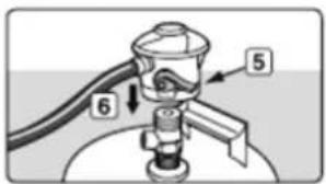 Diagram of a mechanical device with numbered parts labeled 5, 6, and arrows indicating flow or assembly.