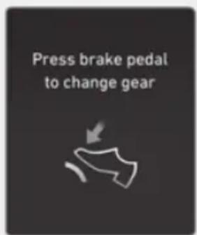 Press brake pedal to change gear