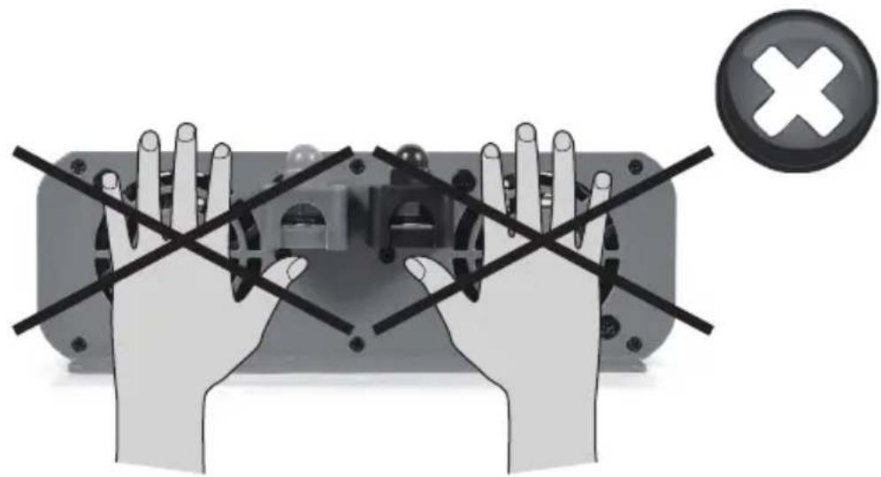 Illustration of a hand holding a device with crossed hands and a circular button containing an 'X' symbol (no text or labels)