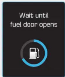 Wait until fuel door opens