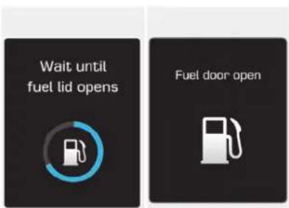 Wait until fuel lid opens Fuel door open