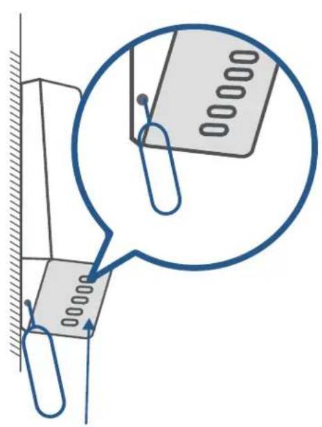 Diagram showing a mechanical or electrical component with a magnified inset highlighting a specific section, likely illustrating a step or connection.