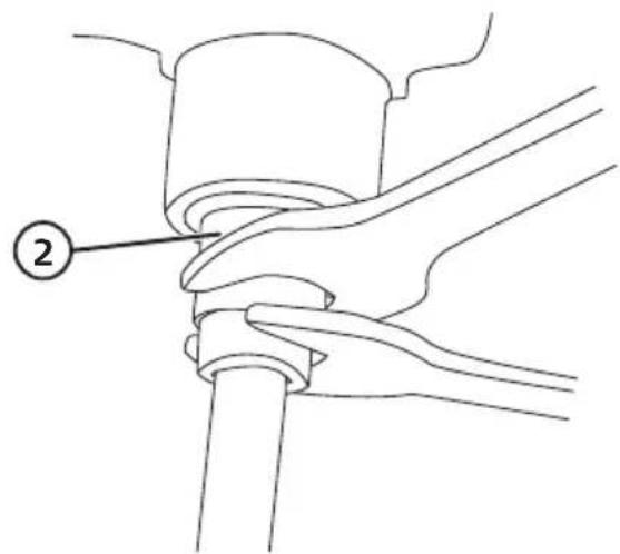 Diagram showing a hand holding a cylindrical object with a numbered label pointing to it, likely illustrating a mechanical or electrical procedure.