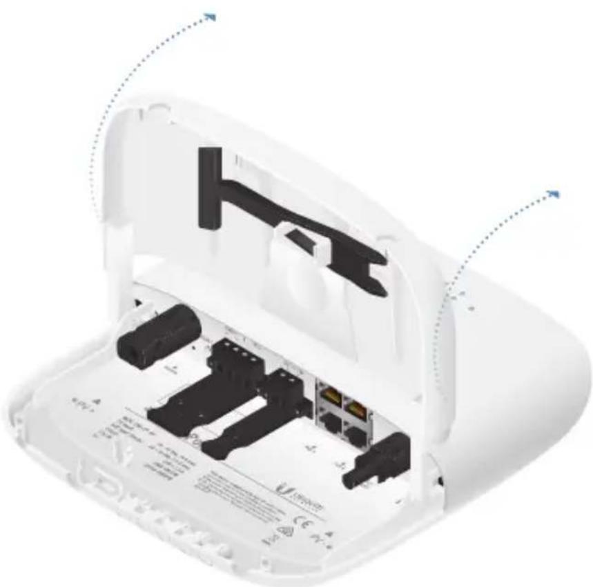 Exploded view of a white electronic device casing showing internal components and wiring (no text or symbols visible)