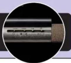 Close-up of a metallic cylindrical object with a textured surface, possibly a tool or component (no visible text or symbols)