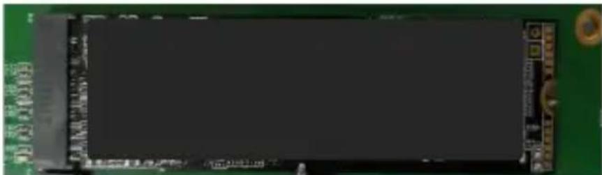 Close-up of a green printed circuit board with a black LCD screen and gold contacts (no visible text or symbols)