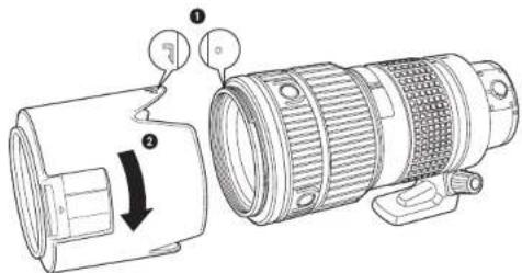 Technical diagram of a camera lens with numbered parts and directional arrow indicating motion or assembly.