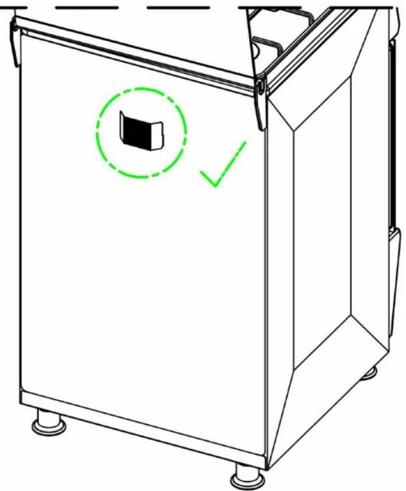 Technical diagram of a mechanical device with a green checkmark indicating a confirmation or inspection point.