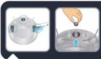 Diagram showing a device with labeled parts and a hand holding a small component, likely illustrating a mechanical or electrical setup.