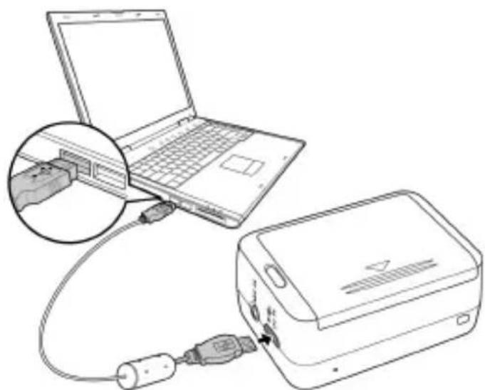 Line drawing of a laptop connected to an electronic device via cable, showing internal components (no text or symbols)