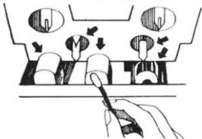 Diagram illustrating mechanical assembly or turning process with labeled components and directional arrows indicating movement