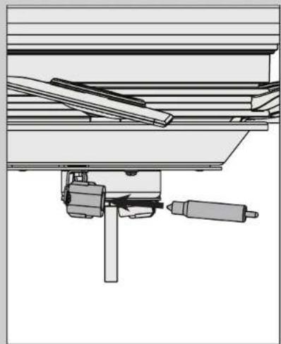 Technical line drawing of a mechanical assembly with a tool and base (no text or symbols)