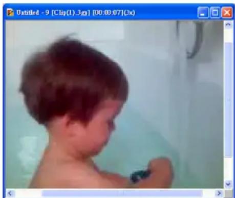 Child washing in a bathtub, no visible text or symbols