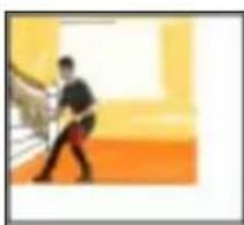 Person walking on a yellow and orange striped surface (no text or symbols visible)