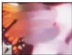 Blurred abstract image with indistinct shapes and colors, no readable text or symbols