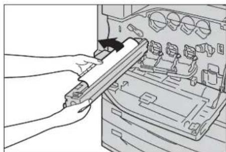DELL C7765dn - Illustration of a hand using a tool to adjust or install electronic components in a computer case (no text or symbols visible) - 1