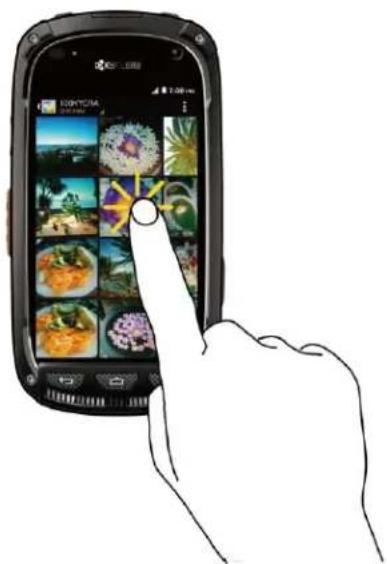 Hand interacting with a mobile phone displaying a grid of food and drink images, with 'KORTOTA' logo visible on the screen.
