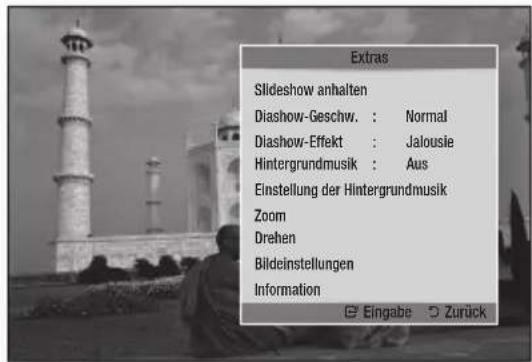 Extras Slideshow anhalten Diashow-Geschw.: Normal Diashow-Effekt: Jalousie Hintergrundmusik: Aus Einstellung der Hintergrundmusik Zoom Drehen Bildeinstellungen Information Eingabe Zurück